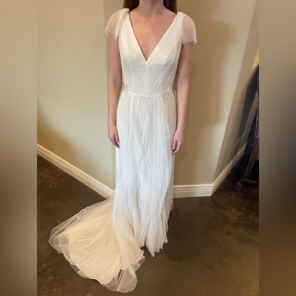 Beautiful Vera Wang wedding dress from David’s Bridal.  Model is a size 0-2.